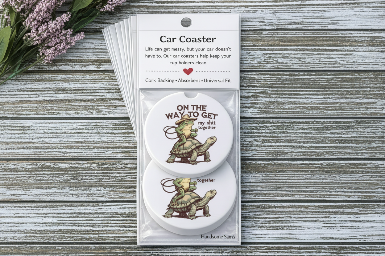 Car coaster set with cartoon turtles and humorous text in packaging on a wooden surface